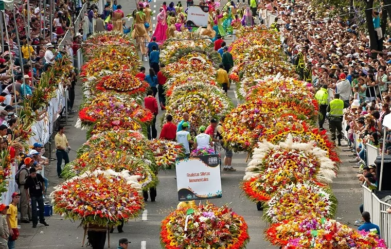 Vibrant flower arrangements carried by participants during the Feria de las Flores in Medellín, Colombia, celebrating the city’s floral heritage and culture.
